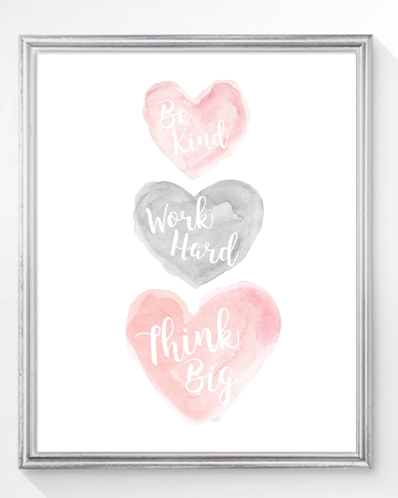 May include: Three watercolor hearts with inspirational messages: Be Kind, Work Hard, Think Big. The hearts are stacked vertically, with the top heart in pink, the middle heart in gray, and the bottom heart in pink.