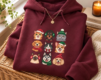 Sudadera con capucha con caras de mascotas navideñas / Patitas festivas de animales navideños