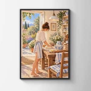 May include: A framed wall art print depicting a person in a white blouse and blue-striped apron kneading dough on a wooden table. The scene includes a blue and white patterned bowl, a rolling pin, and a sunlit terrace with potted plants.