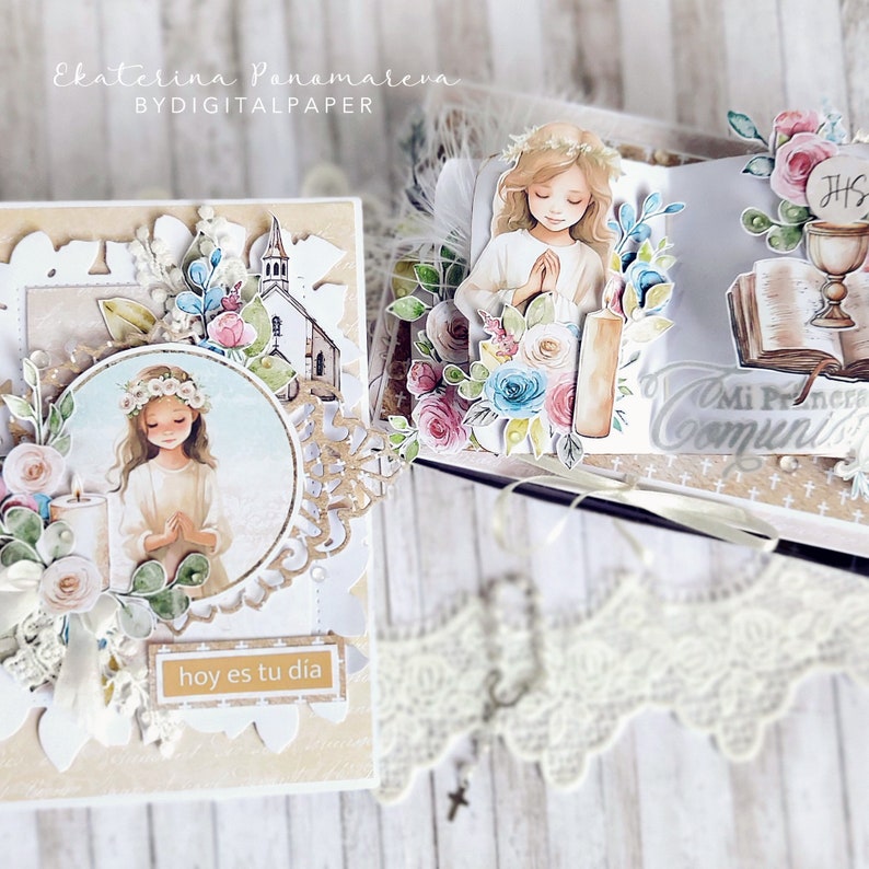 May include: A white card with a watercolor illustration of a girl in a white dress and a floral crown, praying with her hands clasped. The card has a white lace border and a gold inscription that reads "hoy es tu dia".