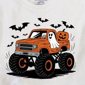 May include: Orange monster truck with a ghost and a jack-o'-lantern in the bed.  The truck is driving on a white background with bats flying around it.  The text "DIGITAL DOWNLOAD" is at the bottom of the image.