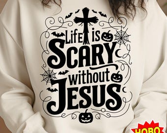 May include: A white sweatshirt with a black graphic design that says "Life is Scary without Jesus". The graphic includes a cross, bats, and pumpkins.