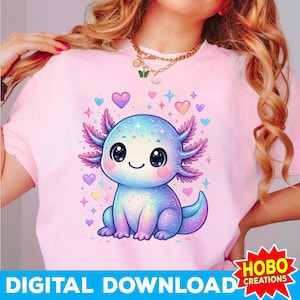 K&ouml;nnte beinhalten: Hellrosa T-Shirt mit einem bunten Cartoon-Axolotl-Design. Der Axolotl ist blau, lila und rosa mit gro&szlig;en schwarzen Augen und einem L&auml;cheln. Der Text "DIGITAL DOWNLOAD" befindet sich am unteren Rand des Shirts.