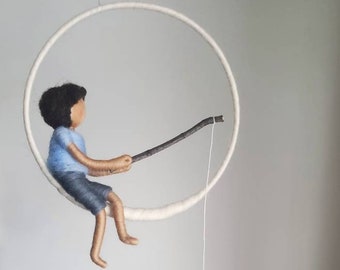 The fishing boy Waldorf inspired needle felted doll mobile: Tan boy with three fishes