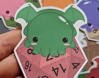 May include: A set of eight stickers featuring a cartoon octopus in various colors, each perched atop a red, pink, orange, green, blue, brown, or purple 20-sided die.