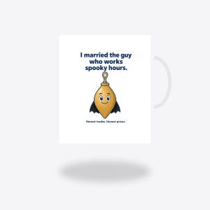 May include: A white mug featuring a cartoon gold plumb bob with a face and black bat wings. The text reads: I married the guy who works spooky hours. Honest trades. Honest prices. The design is centred on the front of the mug.