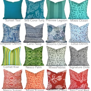 May include: A collection of sixteen square throw pillows featuring various patterns and colors, including teal, blue, green, orange, and red. Each pillow is labeled with names like Sunset Teal, Sea Coral Turq, Preview Lagoon, Mixes Ocean, Empowr Denim, Cane Navy, Blooms Oxford, Lotus Denim, Comet Kiwi, Nesco Palm, MixesPebbles, Signature Dots, Nesco Sunset, Mixes Sunset, Melbourn Red, and Sea Coral Red.