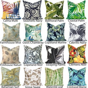 May include: A collection of sixteen square throw pillows featuring various botanical, tropical, and abstract patterns. Designs include palm leaves, ferns, floral motifs, and geometric swirls in color palettes of navy, green, beige, black, and multi-color.