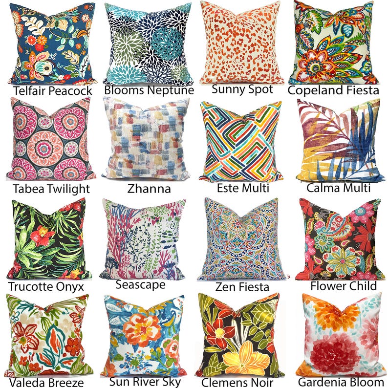 May include: A collection of sixteen square throw pillows featuring diverse patterns including floral, geometric, abstract, and animal prints. Each pillow displays unique color combinations such as blue, orange, pink, green, and black, labeled with names like Telfair Peacock, Blooms Neptune, Sunny Spot, Copeland Fiesta, Tabea Twilight, Zhanna, Este Multi, Calma Multi, Trucotte Onyx, Seascape, Zen Fiesta, Flower Child, Valeda Breeze, Sun River Sky, Clemens Noir, and Gardenia Bloom.