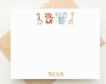 May include: A white card with a zebra, tiger, elephant, and giraffe illustration. The name "MASON" is printed in orange, yellow, and green letters at the bottom of the card.