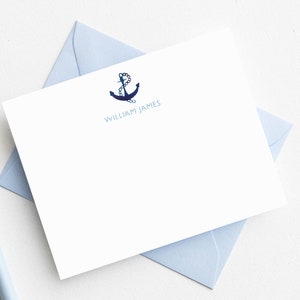 May include: White stationery card with a blue anchor and the name "WILLIAM JAMES" printed in blue.