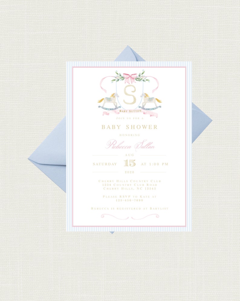 May include: A baby shower invitation with a pink and blue striped background. The invitation features a watercolor illustration of a carousel with two horses and a pink bow. The text on the invitation reads "Baby Sutton, Join us for a Baby Shower Honoring Rebecca Sutton, Saturday, August 15, 2020 at 1:00 PM, Cherry Hills Country Club, 1234 Country Club Road, Cherry Hills, NC 12345, Please RSVP to Kate at 123-456-7800, Rebecca is registered at Babylist."