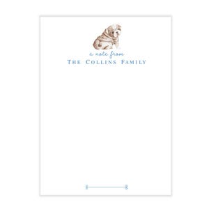 May include: A notecard with a watercolor illustration of a brown and white bulldog puppy. The text "a note from THE COLLINS FAMILY" is printed in blue below the image.