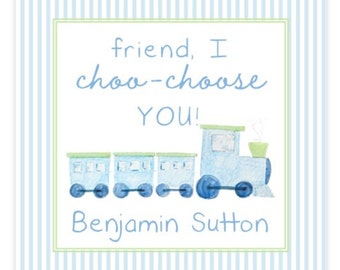 May include: A blue and green train with the text "friend, I choo-choose YOU!" and "Benjamin Sutton" on a light blue and white striped background.