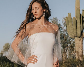 Elegante capa de perlas con cuentas para mono de boda: cubierta nupcial corta con detalles de perlas para fuga o recepción