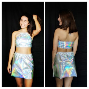 Holographic halter top and skater skirt with shiny rainbow finish.