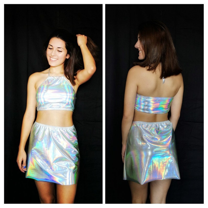 Holographic halter top and skater skirt with shiny rainbow finish.