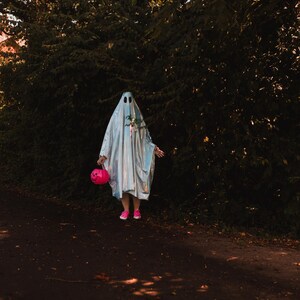 person wearing ghost costume