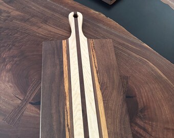 Black Walnut with Maple/Zebra wood strips cutting board