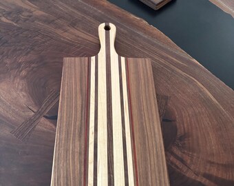 Black Walnut with Maple/Padauk wood strips cutting board