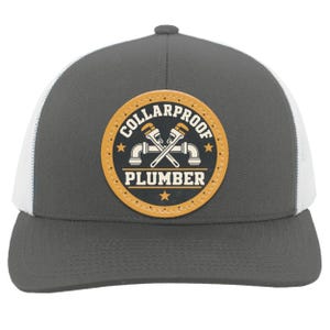 May include: A charcoal gray and white trucker hat featuring a circular tan leather patch on the front. The patch displays the text COLLARPROOF PLUMBER with a graphic of two crossed pipe wrenches and stars in a dark blue and tan color scheme.