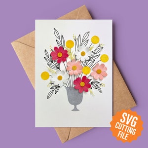 May include: A digital download SVG cutting file for a card featuring a vase with a bouquet of pink, white, and yellow paper flowers. The vase is grey and the flowers are outlined in black.