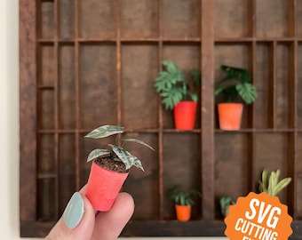 Szablon SVG z miniaturową rośliną doniczkową z papieru, tworzy 6 małych roślin doniczkowych