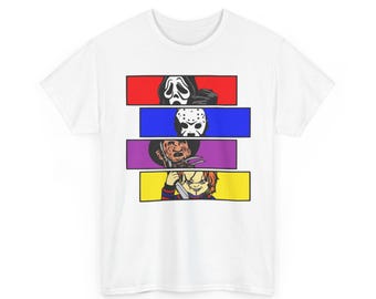 May include: A white short-sleeve t-shirt featuring a graphic print of four stacked rectangular panels. The panels display illustrations of horror movie characters including a ghost mask, a hockey mask, a scarred face with claws, and a doll with a knife.