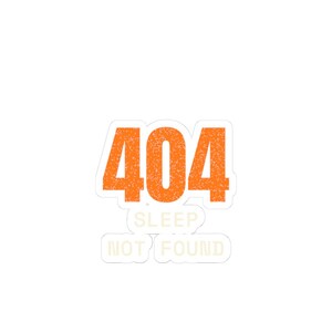 May include: A sticker featuring the bright orange text 404 at the top with a distressed texture. Below the number, the words SLEEP NOT FOUND are printed in a lighter, off-white color, arranged in two separate rectangular speech bubble shapes.