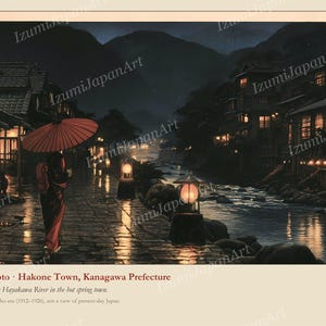 May include: A print depicting a rainy night in Hakone-Yumoto, Kanagawa Prefecture, featuring a person with a red umbrella walking along the Hayakawa River. The scene includes traditional buildings with glowing lights and stone paths at night.