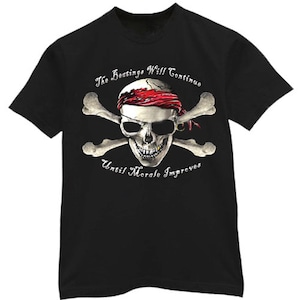 May include: Black t-shirt with a white skull and crossbones design. The skull is wearing a red bandana and has a gold tooth. The text "The Beatings Will Continue Until Morale Improves" is printed below the skull.