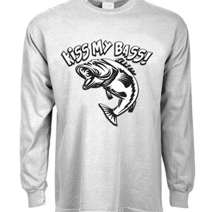 May include: A gray long-sleeve t-shirt with the text "Kiss My Bass!" and a black and white illustration of a bass fish.