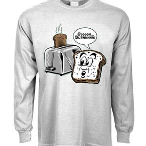 May include: A gray long-sleeve t-shirt with a cartoon illustration of a toaster and a slice of bread with a face. The bread is saying "Oooooh... Burnnnnn!"