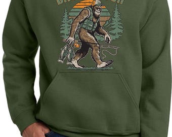 Sudadera con capucha unisex con diseño gráfico de Bassquatch, divertido sasquatch pescador, Bigfoot bebiendo cerveza, color verde