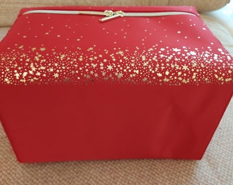 Estee Lauder Train Case Vintage Style Red with gold stars. Fabric interior and exterior. Zippered top opening. Top handle. Storage or travel