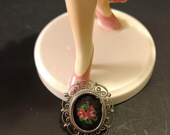 Petit Point Victorian Pin in an Ornate silver tone setting. Pink and cherry red roses with green leaves against black background! Lovely!