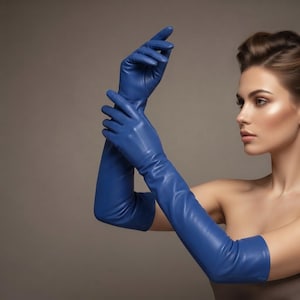 May include: A pair of long, elbow-length blue gloves made of a smooth, matte material. The gloves extend past the elbow, featuring a fitted design that contours to the arm and hand, providing full coverage from the fingers to the upper forearm.