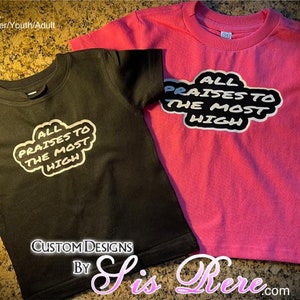 May include: Two short-sleeved t-shirts, one black and one pink, each displaying the text "ALL PRAISES TO THE MOST HIGH" in a white and black design. The shirts are for infants, toddlers, youth, and adults.