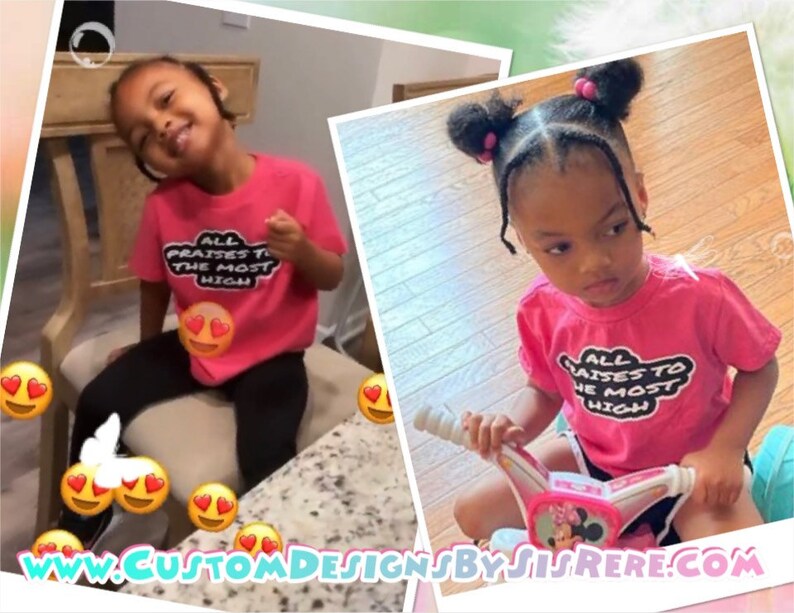 May include: A young child wearing a pink t-shirt with the text "ALL PRAISES TO THE MOST HIGH" in a black and white design. The child is sitting on a chair and smiling. The shirt is paired with black leggings.