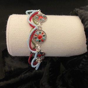 Hand crafted red, aqua and green four strands bracelet
