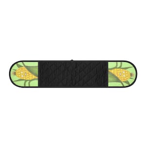 May include: A long, rectangular double oven glove featuring a black quilted centre section and two end panels with a light green background. Each end panel displays a cartoon illustration of a yellow corn cob with a face and green husks.