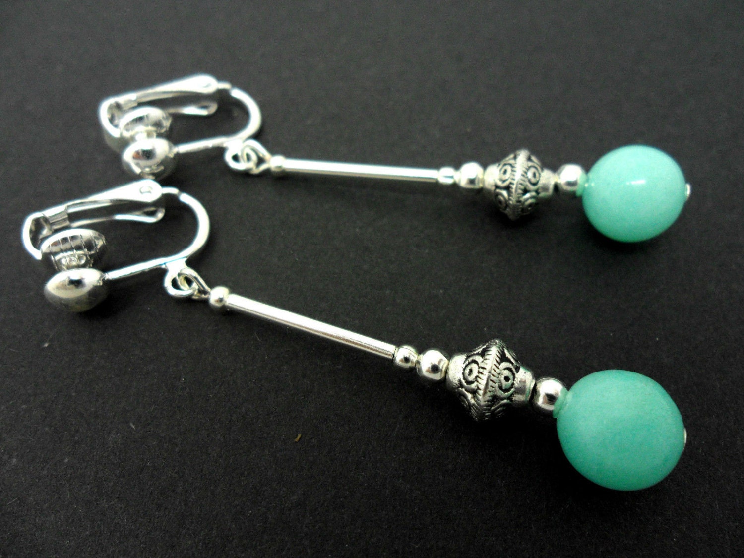 NEW. A PAIR OF TIBETAN SILVER DANGLY STAR//FLOWER LEVERBACK HOOK EARRINGS