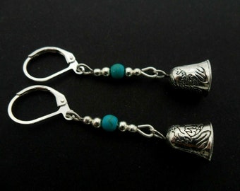 A pair of pretty tibetan silver & turquoise bead bell  themed  dangly leverback hook earrings.