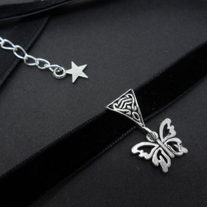 A ladies/girls black velvet 10mm (half inch) choker & butterfly  charm necklace.