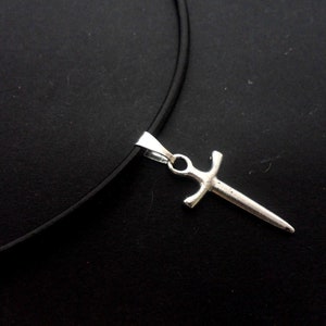 A leather cord 13" - 14" tibetan silver sword charm choker necklace.