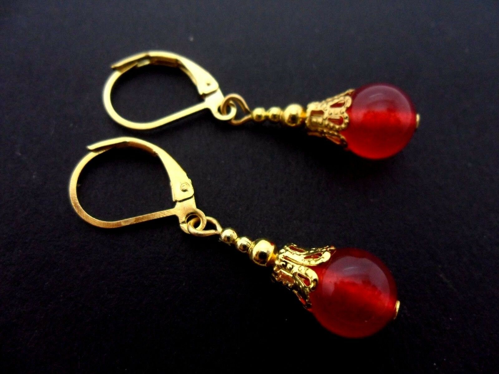 PAIO DI LUNGHI ORECCHINI PENDENTI CON GIADA ONICE E DIAMANTI - Asta GIOIELLI - Casa D'Aste