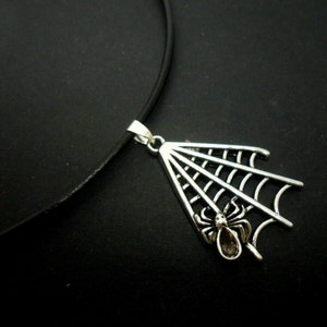 A leather cord 13" - 14" tibetan silver halloween spider web charm choker necklace.