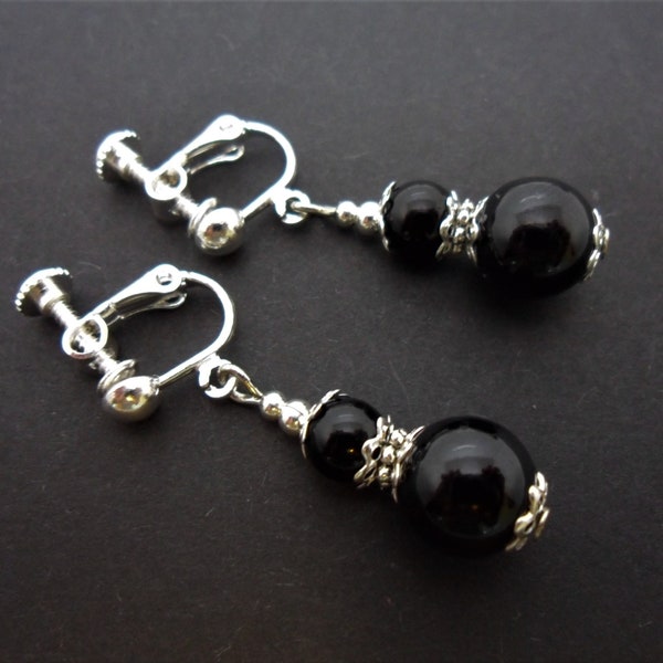 A pair of long black onyx bead  dangly screw back clip on earrings.