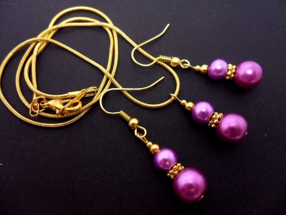 A Hand Made Gold Tone Purple Glass Pearl Necklace and Earring Set