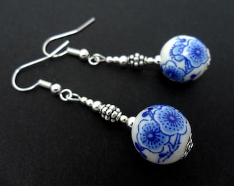 A pair of pretty porcelain flower  bead   dangly earrings.
